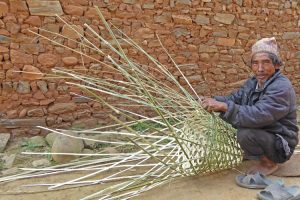 Proud basket weaver on a village walk