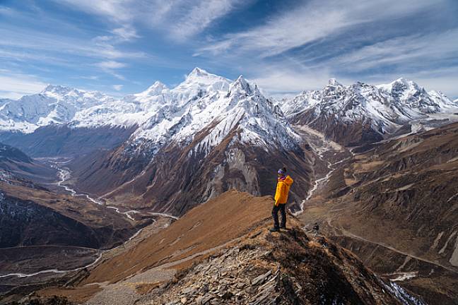 Trekker enjoying views on Samdo Ri Manaslu Circuit 600x400