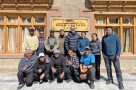 The staff at Snow Leopard Lodge with Harry