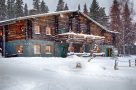 Snow falling on Brandon Lodge