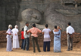 See the reclining Buddha at Polunnaruwa