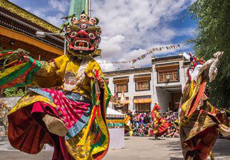 Attend a Buddhist festival in the Indian Himalaya